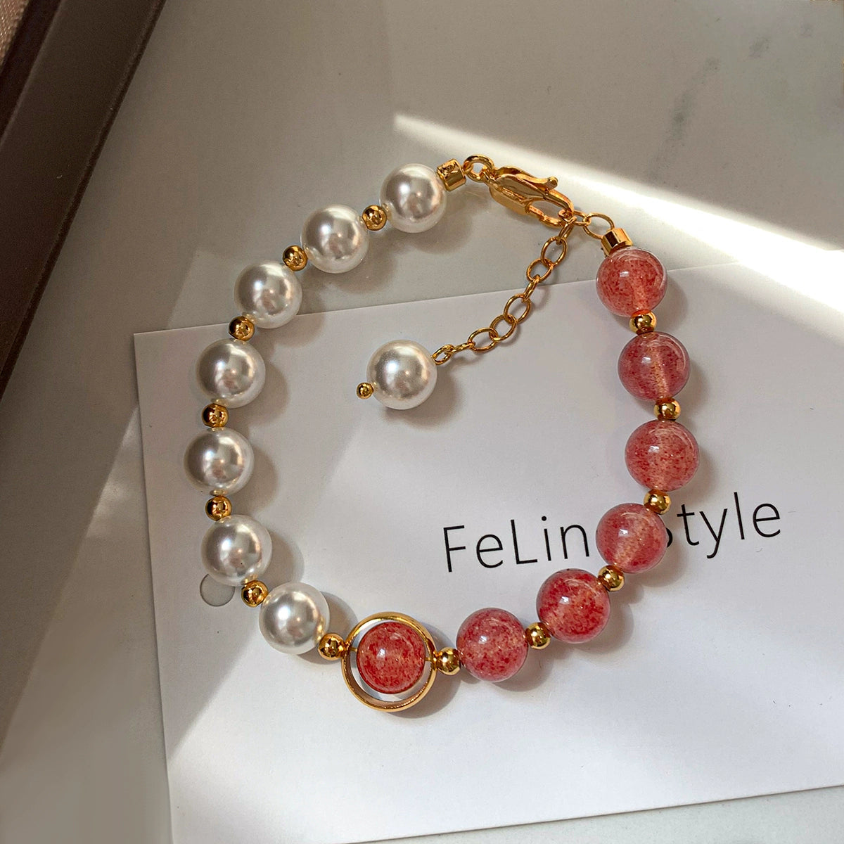 Natural strawberry pink crystal S home pearl bracelet women's light luxury niche exquisite 2025 new metaphysical bracelet