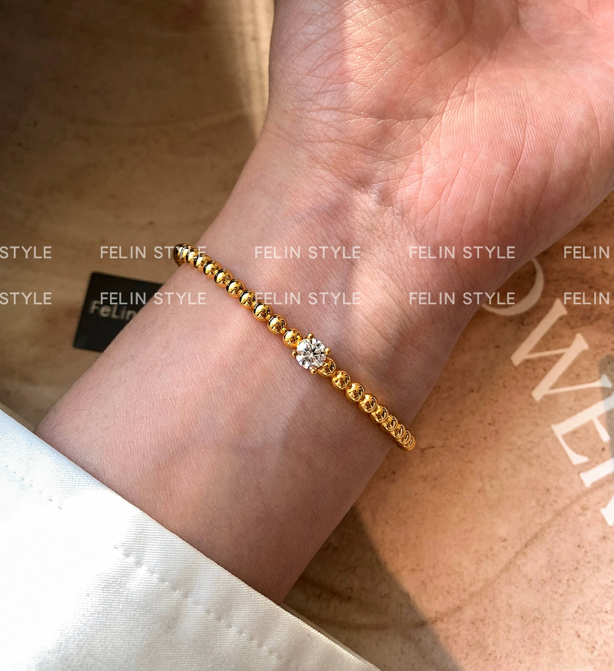 22K gold diamond-encrusted zircon knotted European and American metal bracelet women's light luxury exquisite fashion 2025 new bracelet