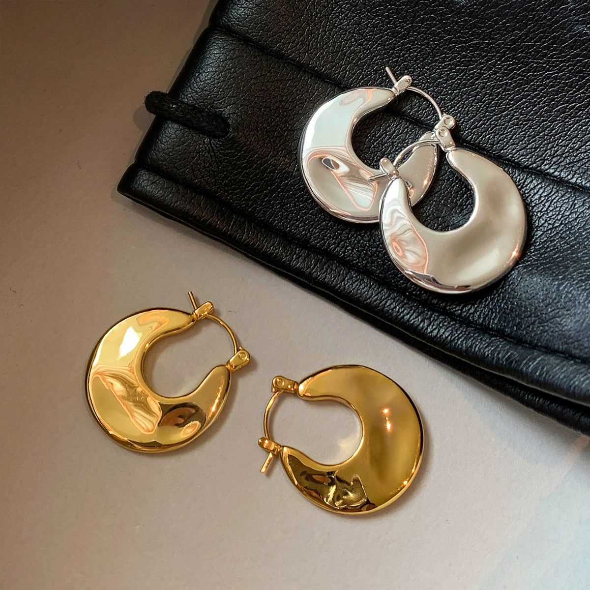 European and American simple personality round metal earrings women's summer light luxury niche high-end sense unique temperament earrings earrings