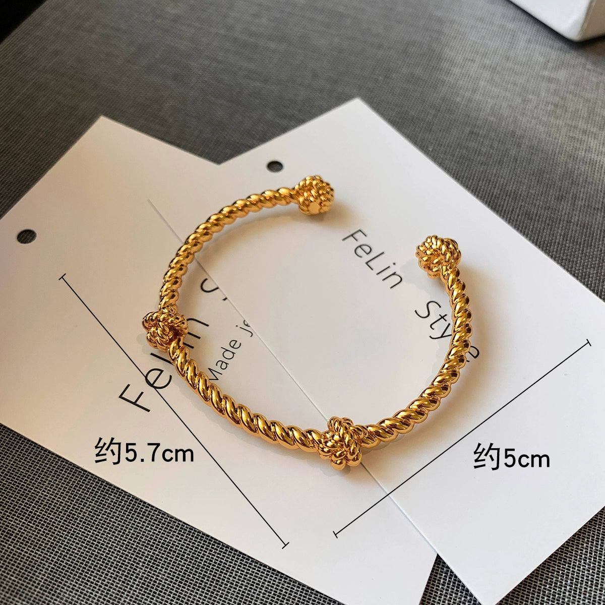 22K gold diamond-encrusted zircon knotted European and American metal bracelet women's light luxury exquisite fashion 2025 new bracelet