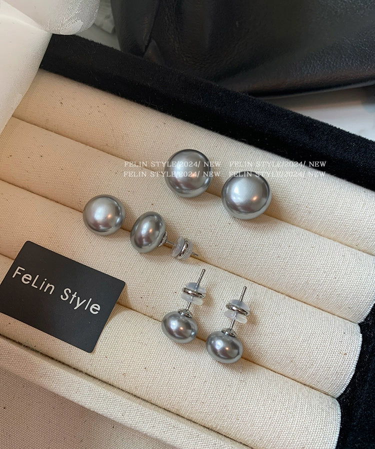 Silver needles are really hemp, silver gray flat round steamed buns, pearl stud earrings, women's 2025 new explosion, French high-end stud earrings.