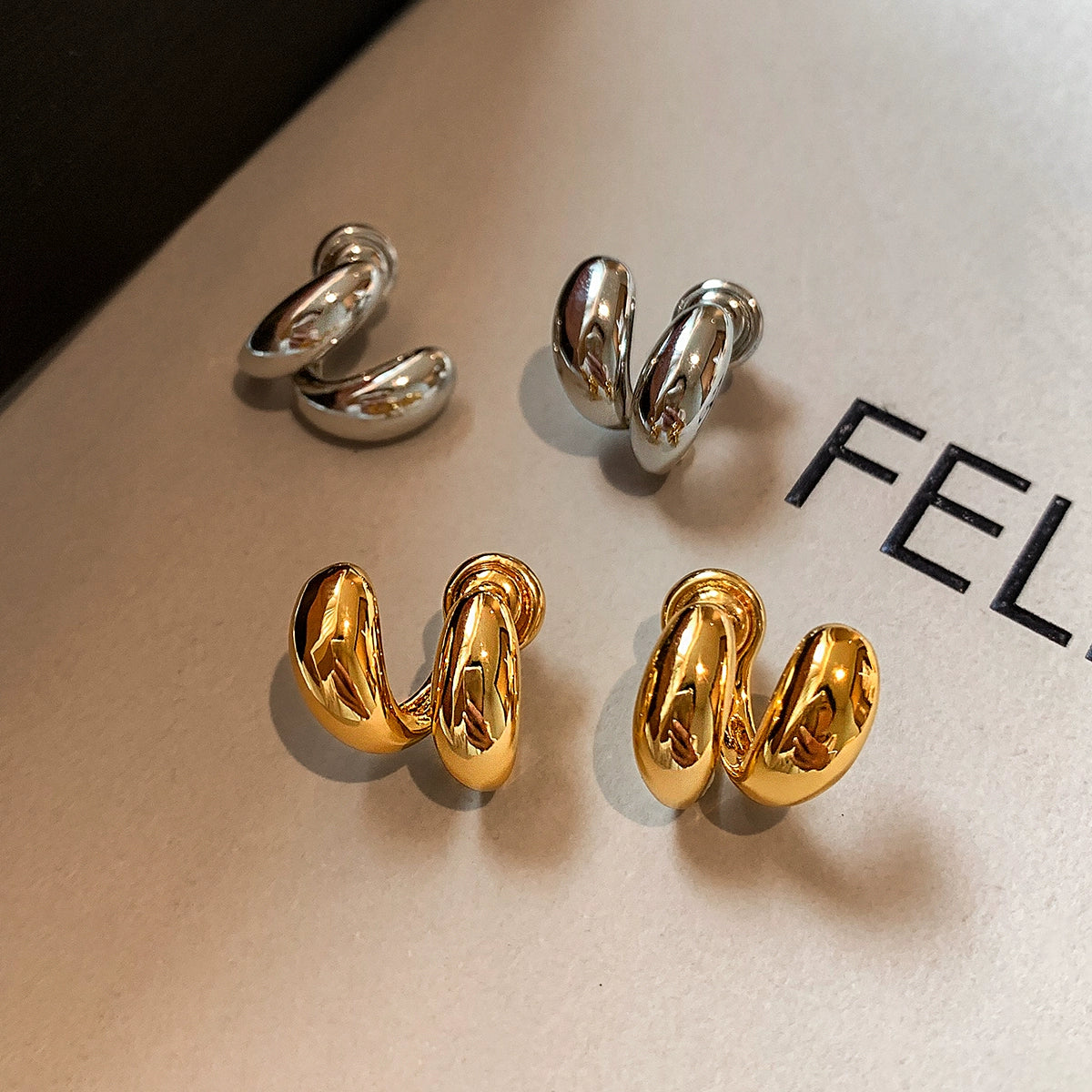 22K gold and silver simple metal water drop beanie stud earrings women's light luxury niche fashion high-end earrings ear jewelry