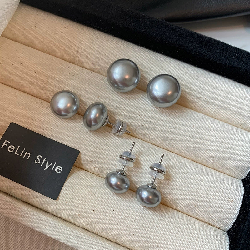 Silver needles are really hemp, silver gray flat round steamed buns, pearl stud earrings, women's 2025 new explosion, French high-end stud earrings.