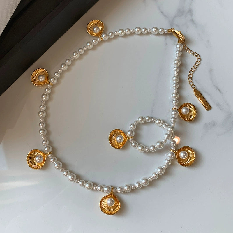 Unique designer European and American gold shell pearl necklace earrings set light luxury niche high-end sweater chain