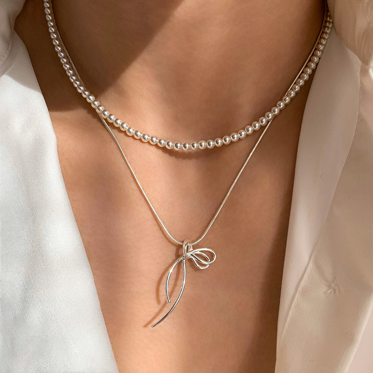 Whole body S925 sterling silver bow pendant necklace women's accessories stacked with light luxury niche high-end exquisite collarbone chain