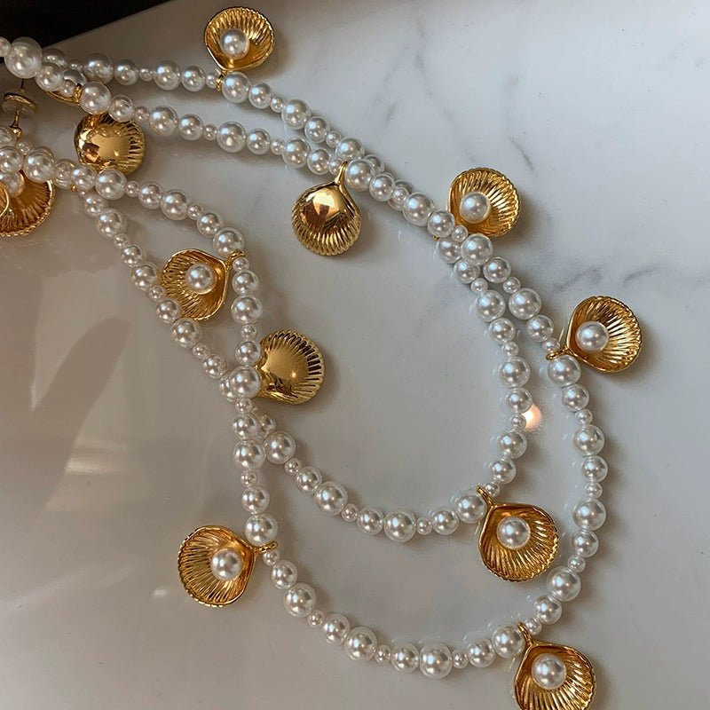 Unique designer European and American gold shell pearl necklace earrings set light luxury niche high-end sweater chain