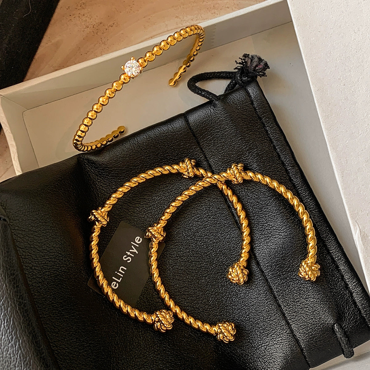 22K gold diamond-encrusted zircon knotted European and American metal bracelet women's light luxury exquisite fashion 2025 new bracelet