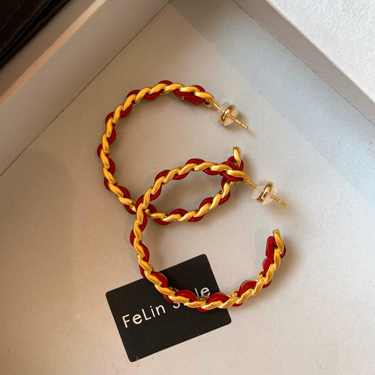 2025 New Year's red leather retro C-shaped circle large earrings women's light luxury unique high-end Chinese New Year earrings earrings