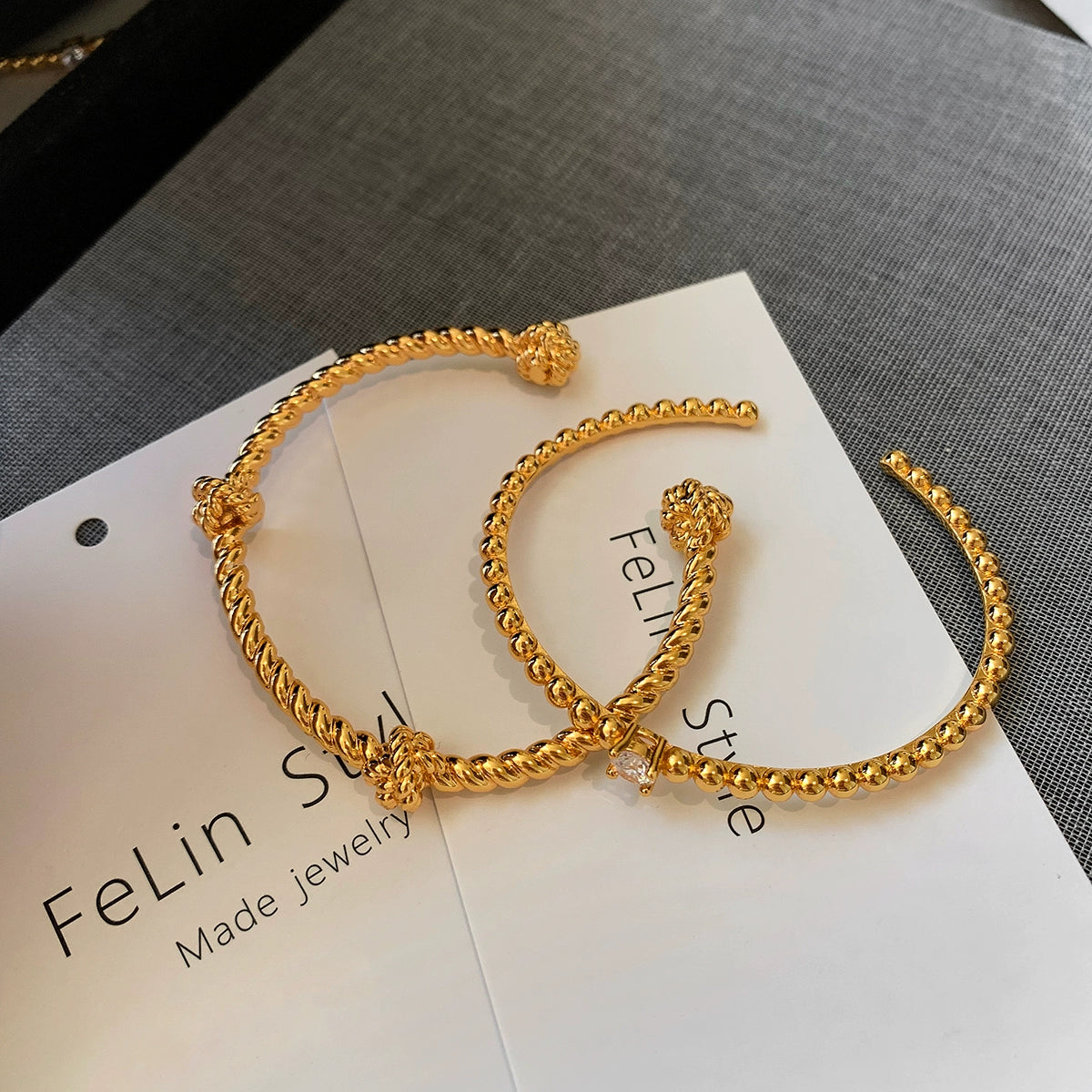 22K gold diamond-encrusted zircon knotted European and American metal bracelet women's light luxury exquisite fashion 2025 new bracelet