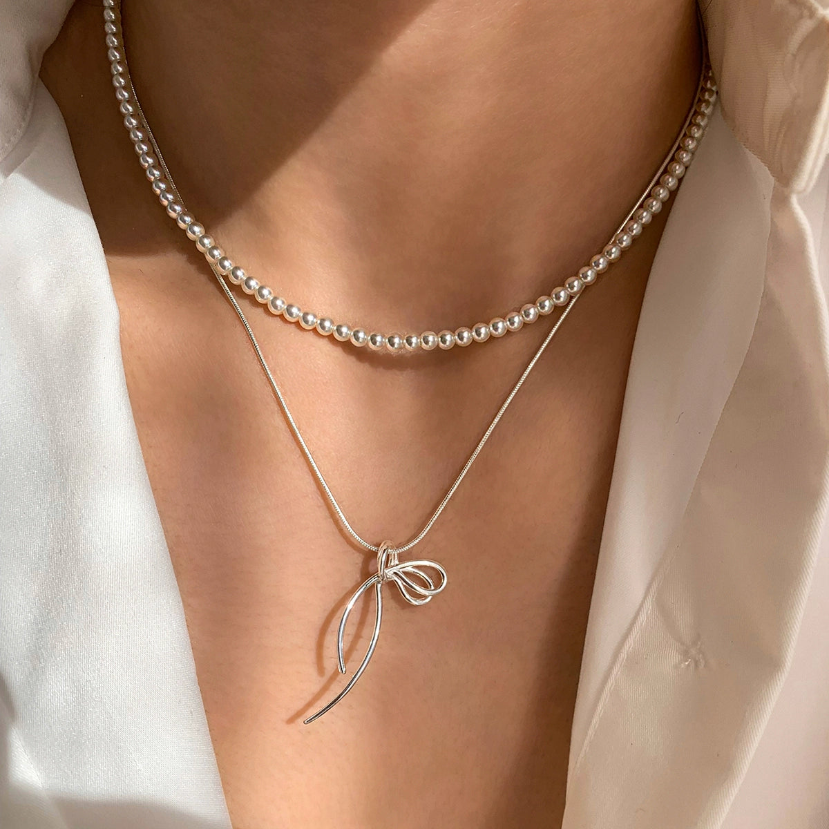 Whole body S925 sterling silver bow pendant necklace women's accessories stacked with light luxury niche high-end exquisite collarbone chain