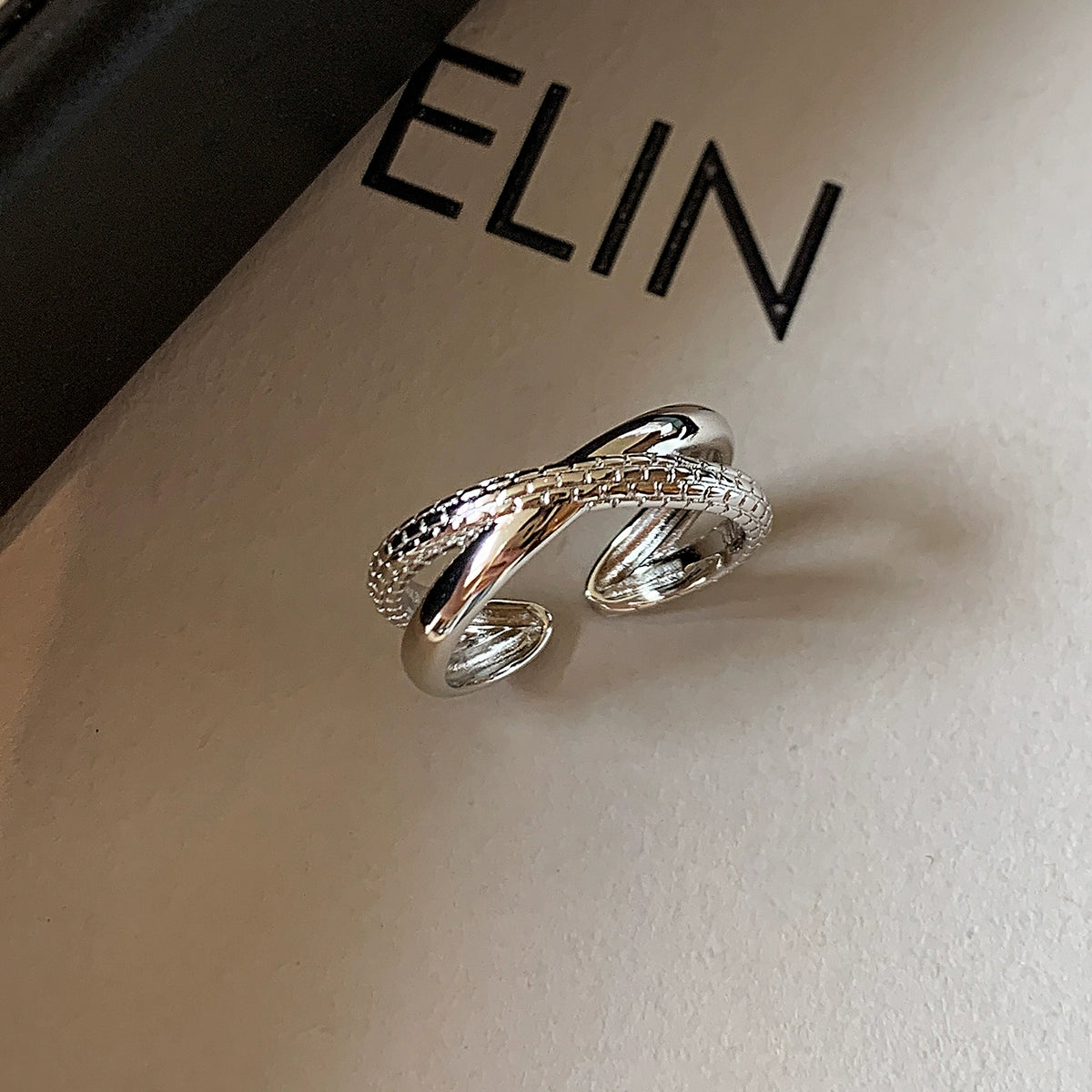 Unique twist pattern metal cross opening ring, female middle finger index finger adjustable light luxury niche design does not fade