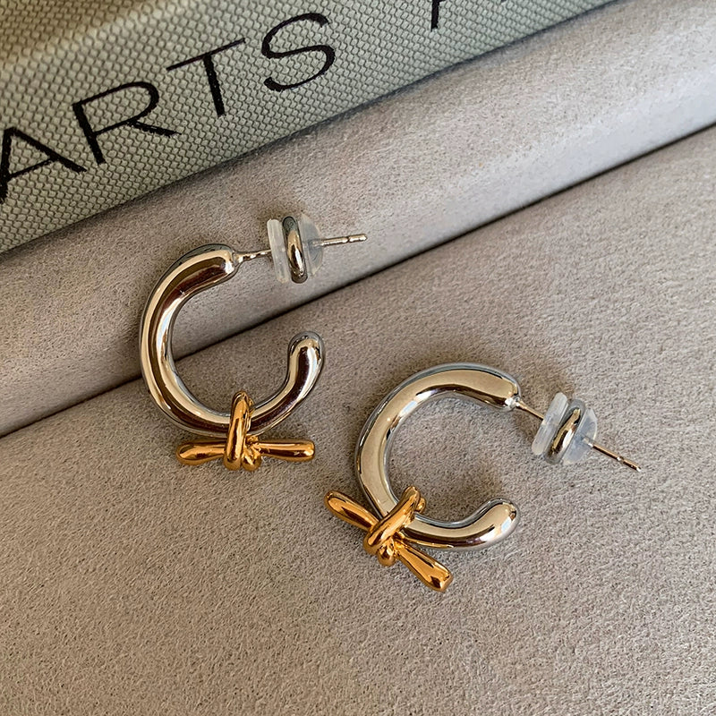 Gold and silver color matching bow C-shaped round earrings, earrings, women's niche design sense, advanced unique simple stud earrings, earrings
