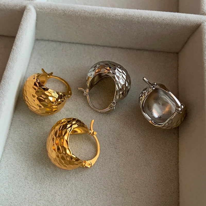 European and American unique metal ball hollow earrings women's niche design sense advanced frigid wind exaggerated personalized earrings