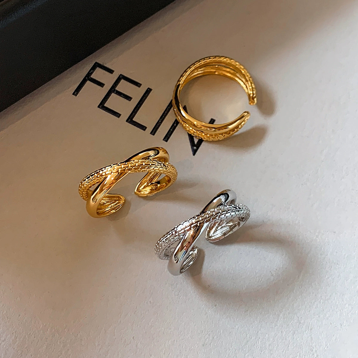 Unique twist pattern metal cross opening ring, female middle finger index finger adjustable light luxury niche design does not fade