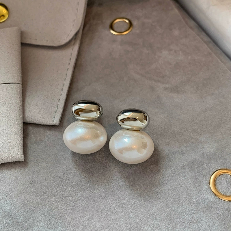 S925 silver needle flat steamed bread big pearl stud earrings women's light luxury niche design sense high-end unique earrings earrings