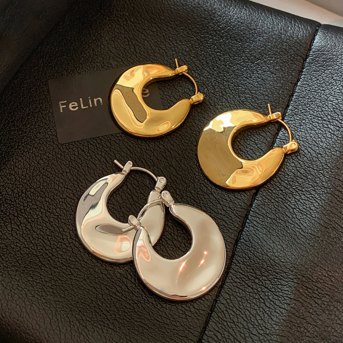 European and American simple personality round metal earrings women's summer light luxury niche high-end sense unique temperament earrings earrings