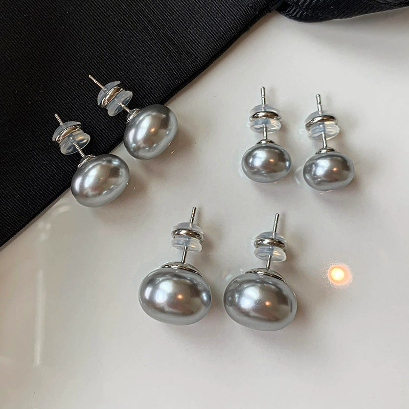 Silver needles are really hemp, silver gray flat round steamed buns, pearl stud earrings, women's 2025 new explosion, French high-end stud earrings.