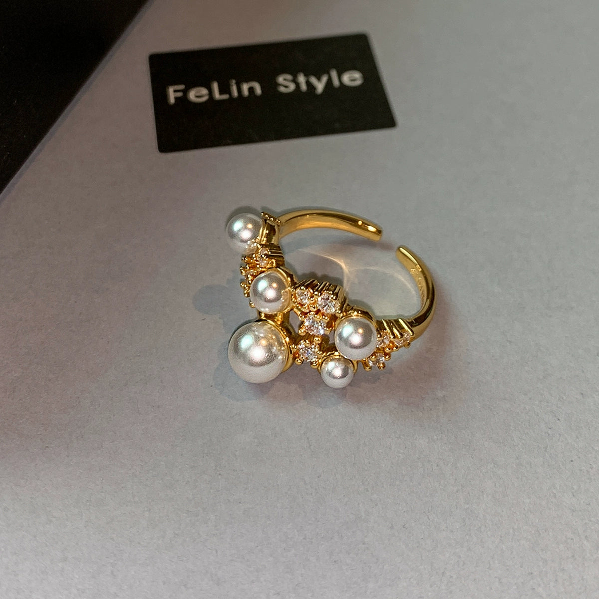 Pearl-set diamond open ring, women's adjustable light luxury niche design, high sense 2025 new middle finger ring