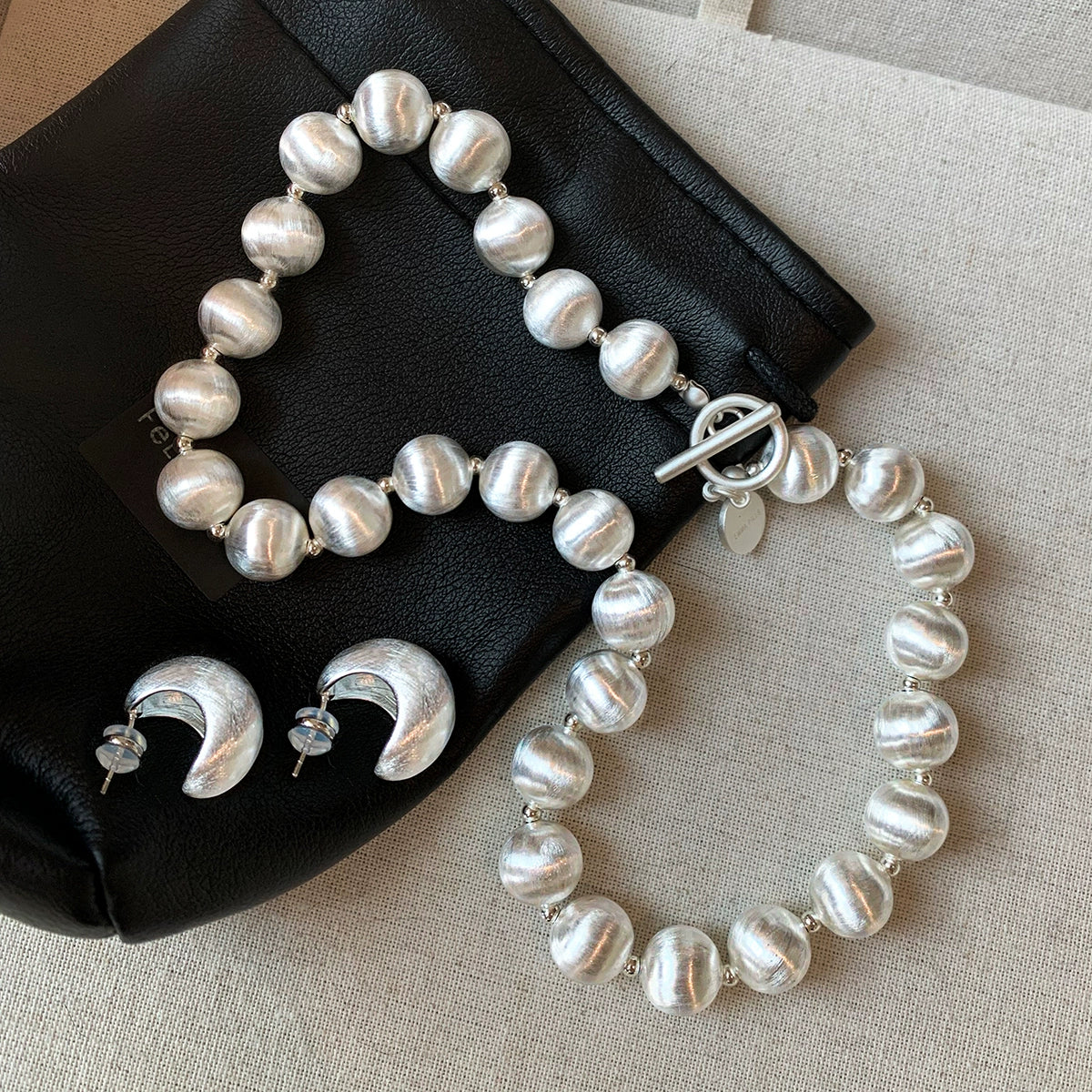 European and American ins exaggerated personality metal heavy industry brushed silver ball necklace women's unique niche design sweater chain