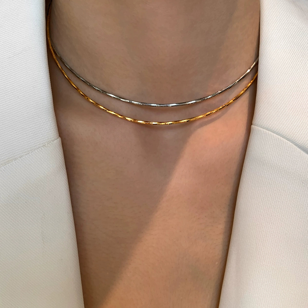 European and American minimalist gold and silver pigment chain snake bone necklace women's accessories light luxury high-end double-layer stacked collarbone chain neck chain