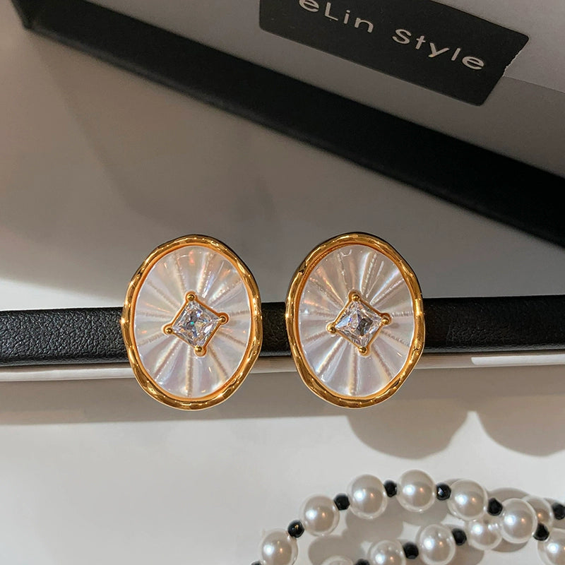 White Fritillary oval zircon earrings women's new French retro high-end sense unique design temperament stud earrings