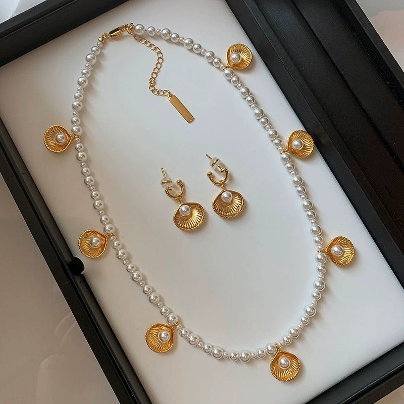 Unique designer European and American gold shell pearl necklace earrings set light luxury niche high-end sweater chain