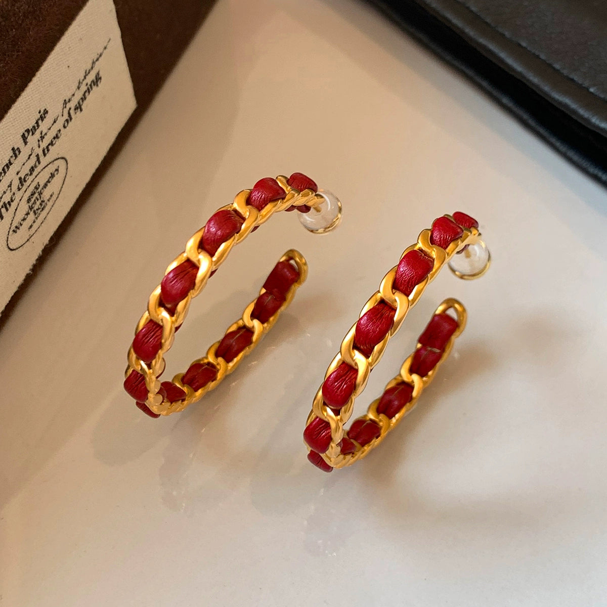 2025 New Year's red leather retro C-shaped circle large earrings women's light luxury unique high-end Chinese New Year earrings earrings