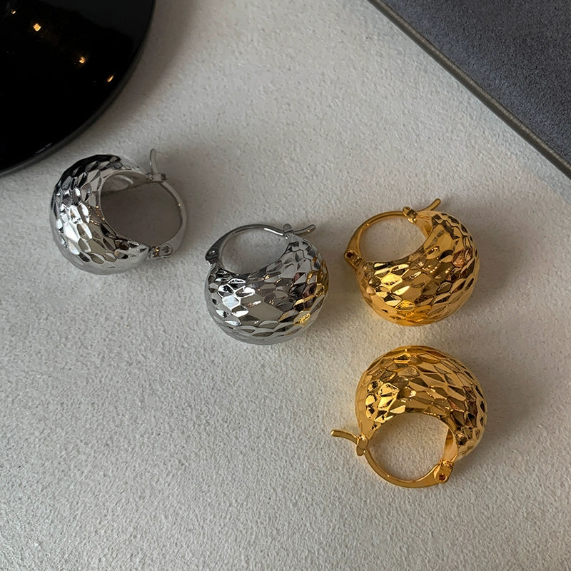 European and American unique metal ball hollow earrings women's niche design sense advanced frigid wind exaggerated personalized earrings