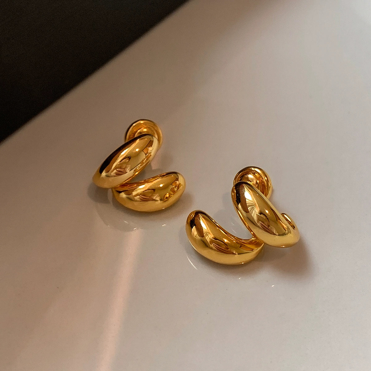 22K gold and silver simple metal water drop beanie stud earrings women's light luxury niche fashion high-end earrings ear jewelry