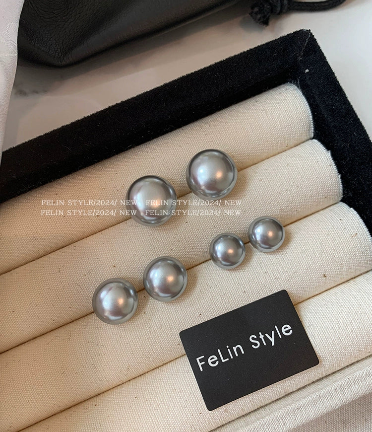 Silver needles are really hemp, silver gray flat round steamed buns, pearl stud earrings, women's 2025 new explosion, French high-end stud earrings.