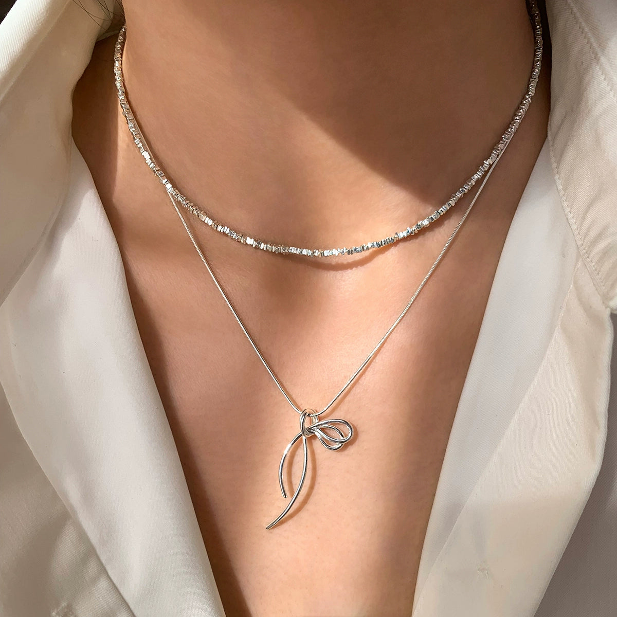Whole body S925 sterling silver bow pendant necklace women's accessories stacked with light luxury niche high-end exquisite collarbone chain