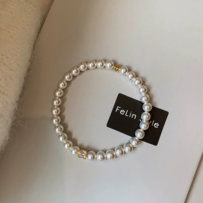 Aurora Maduo, hemp gray Australia white diamond pearl bracelet, girls light luxury exquisite niche 2025 new bracelet.