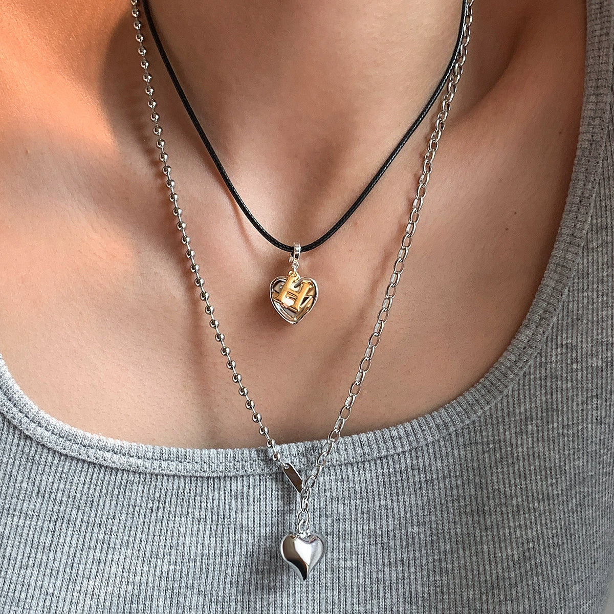 Original European and American long leather rope woven chain love pendant necklace women's accessories light luxury high-end sweater sweater chain