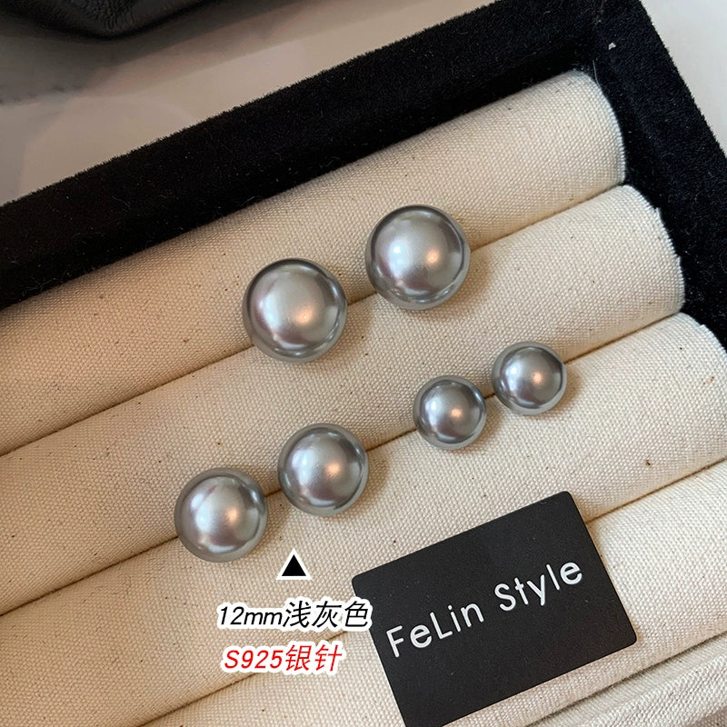 Silver needles are really hemp, silver gray flat round steamed buns, pearl stud earrings, women's 2025 new explosion, French high-end stud earrings.