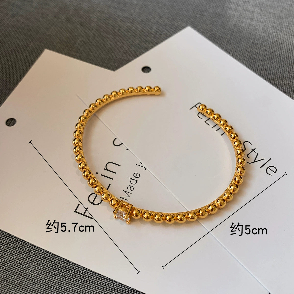 22K gold diamond-encrusted zircon knotted European and American metal bracelet women's light luxury exquisite fashion 2025 new bracelet