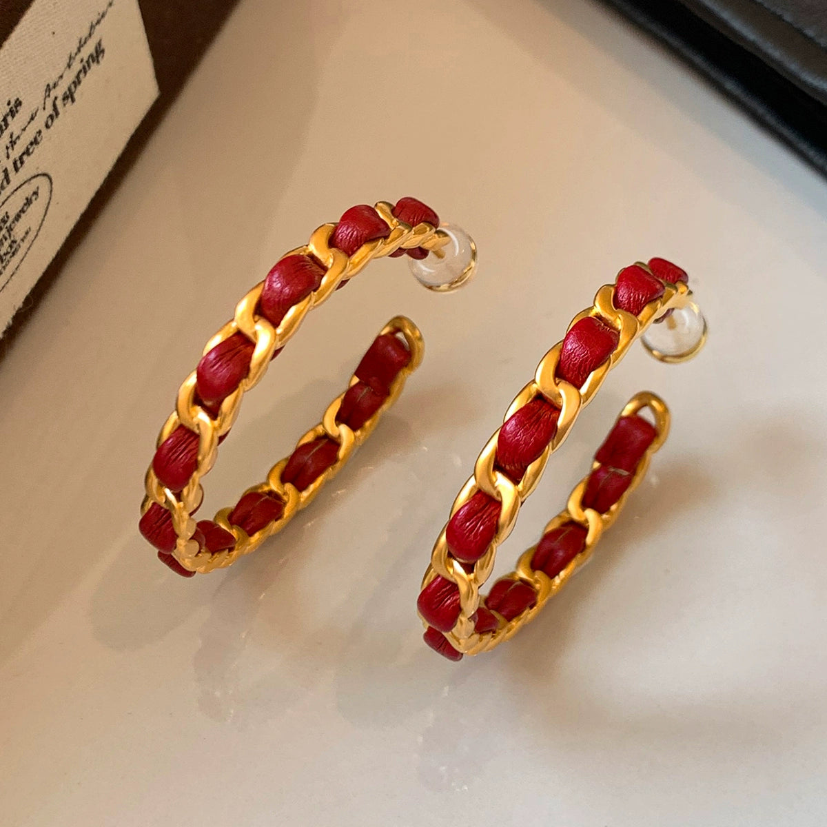 2025 New Year's red leather retro C-shaped circle large earrings women's light luxury unique high-end Chinese New Year earrings earrings